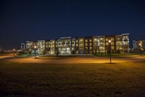 Apartment Rentals in Sugar Land, TX - Community Exterior Building at Night