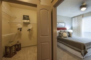 Two Bedroom Apartments in Sugar Land, Texas - Model Bathroom and Walk-In Closet